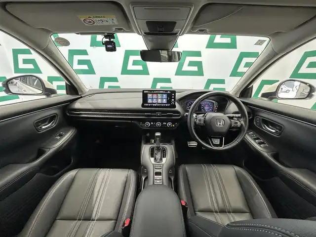 ホンダ ＺＲ－Ｖ Z 鹿児島県 2024(令6)年 2万km プラチナホワイトパール ディスプレイオーディオ(ナビ機能付)/(フルセグTV/Bluetooth/AppleCarPlay/AndroidAuto)/マルチビューカメラシステム/前席シートヒーター/ステアリングヒーター/Honda SENSING/　・衝突軽減ブレーキ（CMBS）/　・先行車発進お知らせ機能/　・歩行者事故低減ステアリング/　・路外逸脱抑制機能/　・標識認識機能/　・渋滞追従機能付アダプティブクルーズコントロール（ACC）/　・車線維持支援システム（LKAS）/　・トラフィックジャムアシスト（渋滞運転支援機能）/　・ブラインドスポットインフォメーション/　・誤発進抑制機能/　・後方誤発進抑制機能/　・近距離衝突軽減ブレーキ/　・パーキングセンサーシステム/　・後退出庫サポート/　・アダプティブドライビングビーム/ハンズフリーアクセスパワーテールゲート/ワイヤレス充電/ドライブレコーダー/ETC2.0/LEDヘッドライト/純正アルミホイール/純正フロアマット