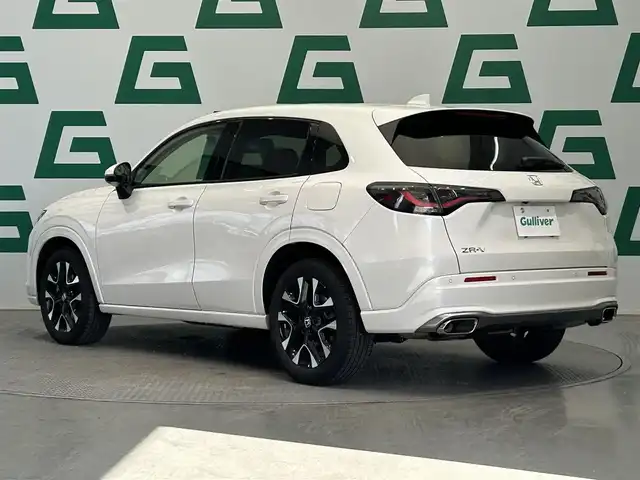 ホンダ ＺＲ－Ｖ Z 鹿児島県 2024(令6)年 2万km プラチナホワイトパール ディスプレイオーディオ(ナビ機能付)/(フルセグTV/Bluetooth/AppleCarPlay/AndroidAuto)/マルチビューカメラシステム/前席シートヒーター/ステアリングヒーター/Honda SENSING/　・衝突軽減ブレーキ（CMBS）/　・先行車発進お知らせ機能/　・歩行者事故低減ステアリング/　・路外逸脱抑制機能/　・標識認識機能/　・渋滞追従機能付アダプティブクルーズコントロール（ACC）/　・車線維持支援システム（LKAS）/　・トラフィックジャムアシスト（渋滞運転支援機能）/　・ブラインドスポットインフォメーション/　・誤発進抑制機能/　・後方誤発進抑制機能/　・近距離衝突軽減ブレーキ/　・パーキングセンサーシステム/　・後退出庫サポート/　・アダプティブドライビングビーム/ハンズフリーアクセスパワーテールゲート/ワイヤレス充電/ドライブレコーダー/ETC2.0/LEDヘッドライト/純正アルミホイール/純正フロアマット