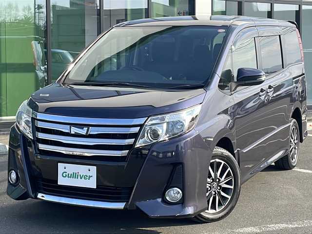 トヨタ ノア Si 道東・釧路十勝 2015(平27)年 7.6万km ダークバイオレットマイカメタリック ・4WD/・ワンオーナー/・寒冷地仕様/・ALPINESDメモリナビ/（BT・CD・DVD・USB・フルセグ・ラジオ）/・社外テレビキャンセラー/・アルパイン10.1インチフリップダウンモニター/・バックカメラ/・片側パワースライドドア/・スマートキー/・プッシュスタート/・MTモード付AT/・ETC/・LEDヘッドライト/・フォグライト/・オートライト/・アイドリングストップ/・純正フロアマット/・ドアバイザー/・純正16インチアルミホイール