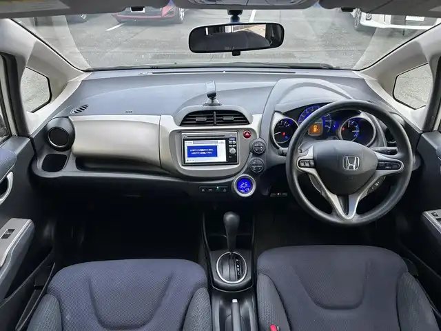 ホンダ フィット ハイブリット スマート セレクション 静岡県 2011(平23)年 12.2万km プレミアムホワイトパール 純正ナビ/ワンセグ/SD/CD/DVD/ETC/クルーズコントロール/ドアバイザー/ウィンカーミラー/純正フロアマット