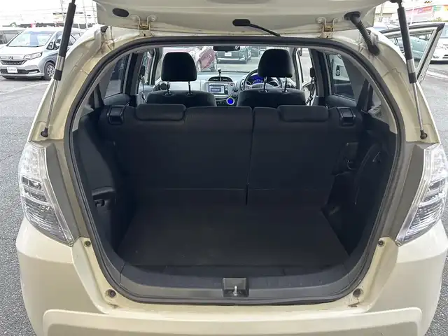 ホンダ フィット ハイブリット スマート セレクション 静岡県 2011(平23)年 12.2万km プレミアムホワイトパール 純正ナビ/ワンセグ/SD/CD/DVD/ETC/クルーズコントロール/ドアバイザー/ウィンカーミラー/純正フロアマット