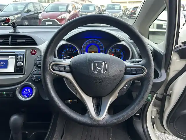 ホンダ フィット ハイブリット スマート セレクション 静岡県 2011(平23)年 12.2万km プレミアムホワイトパール 純正ナビ/ワンセグ/SD/CD/DVD/ETC/クルーズコントロール/ドアバイザー/ウィンカーミラー/純正フロアマット