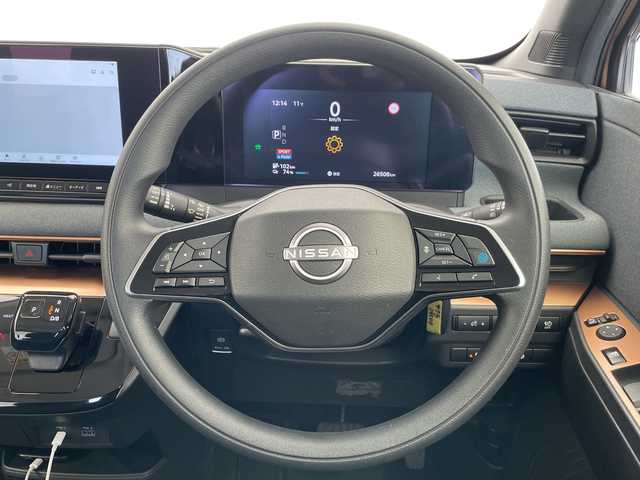 日産 サクラ G 愛知県 2022(令4)年 2.7万km 茶／シルバー プロパイロット/純正8型ディスプレイオーディオナビ/全方位カメラ/レーダークルーズコントロール/シートヒーター/コーナーセンサー/アルミホイール/ETC2.0/レーンキープアシスト/ドライブレコーダー/充電ケーブルあり/衝突軽減システム/フルセグ/Bluetooth/ステアリングスイッチ/スマートキー/プッシュスタート