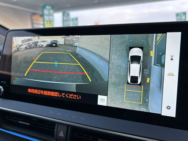 トヨタ プリウス Z 大阪府 2024(令6)年 2.8万km プラチナホワイトパールマイカ ワンオーナー/4WD/純正12.3インチナビ/・フルセグTV/Bluetooth/USBタイプC/・AppleCarPay/AndroidAuto/パノラミックビューモニター（全方位カメラ）/デジタルインナーミラー/前後ドライブレコーダー/純正ビルトインETC2.0/セーフティセンス/・プリクラッシュ/・緊急時操舵支援/・フロントクロストラフィックアラート/・レーンチェンジアシスト/・レーントレーシンングアシスト/・レーンディパーチャーアラート/・レーダークルーズコントロール/・オートマチックハイビーム/・ロードサインアシスト/ブラインドスポットモニター/トヨタチームメイト（アドバントパーク）/レザーシート/メモリー付パワーシート（運転席）/シートヒーター（前席）/シートベンチレーション（前席）/LEDヘッドランプ/革巻きステアリング/ステアリングスイッチ/ステアリングヒーター/オートエアコン/ナノイーX/パワーバックドア/充電用USBタイプC/ワイヤレス充電/AC100/1500W/レーダー探知機(YK-3000)/ガナドールマフラー/プッシュスタート/スマートキー×２/取扱説明書/保証書