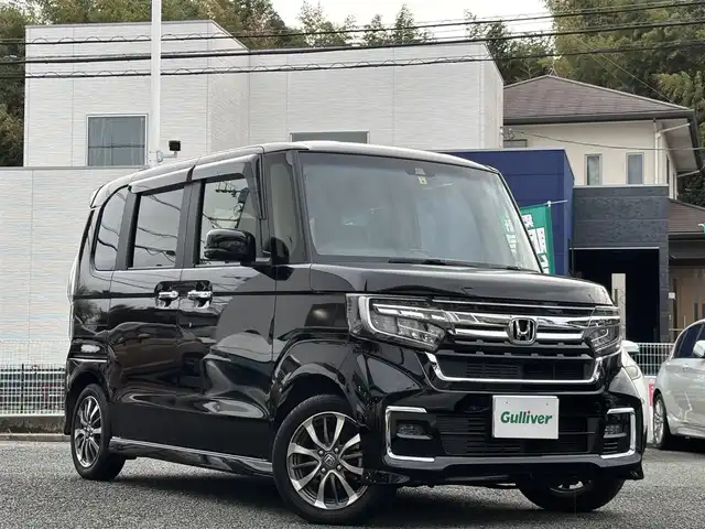 ホンダ Ｎ ＢＯＸ カスタム L 熊本県 2022(令4)年 2.8万km クリスタルブラックパール 社外ナビ（MDV-S708L）/【フルセグ/Bluetooth/CD/DVD/ラジオ】/バックカメラ/両側パワースライドドア/レーダークルーズコントロール/衝突軽減ブレーキ/先行車発進お知らせ機能/レーンキープアシスト/標識認識機能/パーキングセンサー/横滑り防止機能/ECON/前席シートヒーター/ブレーキホールド/ETC/純正14インチAW/オートライト/LEDヘッドライト/フォグランプ/ステアリングスイッチ/フロアマット/ドアバイザー