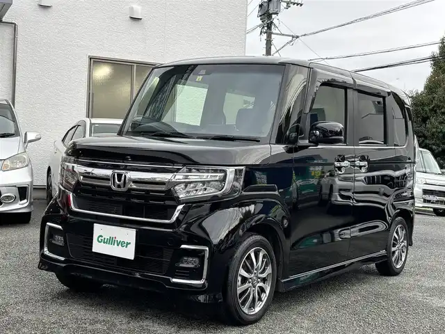 ホンダ Ｎ ＢＯＸ カスタム L 熊本県 2022(令4)年 2.8万km クリスタルブラックパール 社外ナビ（MDV-S708L）/【フルセグ/Bluetooth/CD/DVD/ラジオ】/バックカメラ/両側パワースライドドア/レーダークルーズコントロール/衝突軽減ブレーキ/先行車発進お知らせ機能/レーンキープアシスト/標識認識機能/パーキングセンサー/横滑り防止機能/ECON/前席シートヒーター/ブレーキホールド/ETC/純正14インチAW/オートライト/LEDヘッドライト/フォグランプ/ステアリングスイッチ/フロアマット/ドアバイザー