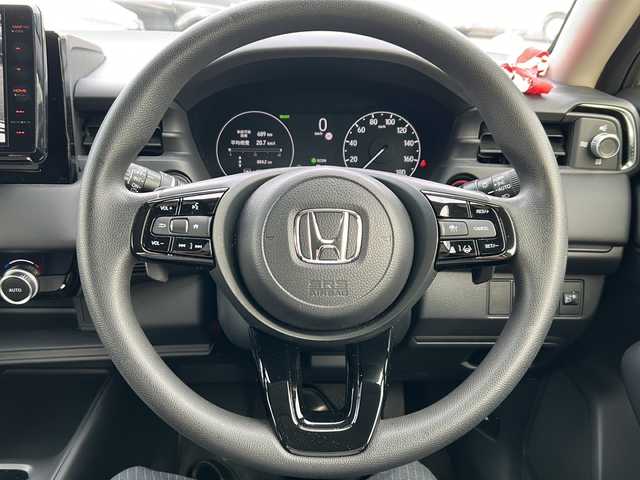 ホンダ ヴェゼル ハイブリッド e:HEV X 愛知県 2022(令4)年 0.6万km プラチナホワイトパール /禁煙車/ワンオーナー/ディーラー整備記録簿R4.5.6//9インチフローティングナビ/フルセグ/BT/USB//CD/DVD/SD/MSV//バックカメラ/前後ドラレコ/ETC//CMBS/ACC/LKAS/RSA//先行車発信告知/誤発進抑制/路外逸脱抑制//ステアリングスイッチ/パドルシフト//純正LEDオートライト/オートハイビーム//純正LEDフォグランプ//電動パーキングブレーキ//電動格納ウインカーミラー//前後クリソナ//ダウンヒルアシストコントロール//W＋サイドエアバック//カーテンエアバック//トノカバー/ドアバイザー/フロアマット//AW付きスタッドレスタイヤ4本積載//新車時保証書//取扱説明書//スペアキー有