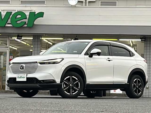 ホンダ ヴェゼル ハイブリッド e:HEV X 愛知県 2022(令4)年 0.6万km プラチナホワイトパール /禁煙車/ワンオーナー/ディーラー整備記録簿R4.5.6//9インチフローティングナビ/フルセグ/BT/USB//CD/DVD/SD/MSV//バックカメラ/前後ドラレコ/ETC//CMBS/ACC/LKAS/RSA//先行車発信告知/誤発進抑制/路外逸脱抑制//ステアリングスイッチ/パドルシフト//純正LEDオートライト/オートハイビーム//純正LEDフォグランプ//電動パーキングブレーキ//電動格納ウインカーミラー//前後クリソナ//ダウンヒルアシストコントロール//W＋サイドエアバック//カーテンエアバック//トノカバー/ドアバイザー/フロアマット//AW付きスタッドレスタイヤ4本積載//新車時保証書//取扱説明書//スペアキー有