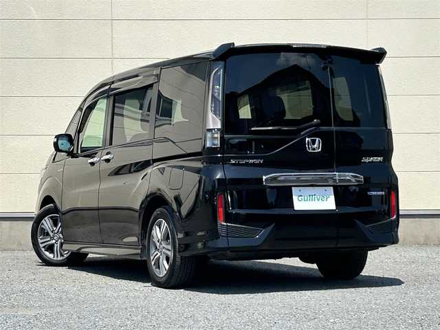 ホンダ ステップワゴン スパーダ ハイブリッド G ホンダセンシング 茨城県 2018(平30)年 7.8万km プレミアムスパークルブラックパール 純正９インチナビ/・フルセグTV/・Bluetooth接続/・DVD再生機能/バックカメラ/後部座席モニター/クルーズコントロール/ホンダセンシング/ビルトインETC/前方ドライブレコーダー/３列シート/両側パワースライドドア/LEDオートライト/純正１６インチアルミホイール/純正フロアマット/USB入力端子