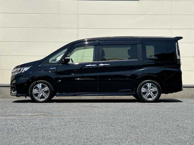 ホンダ ステップワゴン スパーダ ハイブリッド G ホンダセンシング 茨城県 2018(平30)年 7.8万km プレミアムスパークルブラックパール 純正９インチナビ/・フルセグTV/・Bluetooth接続/・DVD再生機能/バックカメラ/後部座席モニター/クルーズコントロール/ホンダセンシング/ビルトインETC/前方ドライブレコーダー/３列シート/両側パワースライドドア/LEDオートライト/純正１６インチアルミホイール/純正フロアマット/USB入力端子