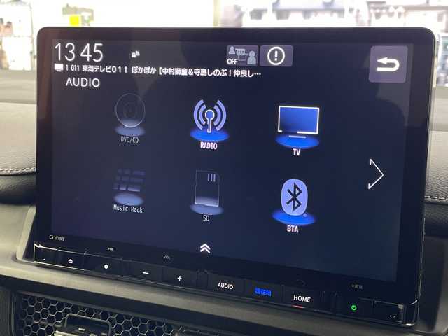 ホンダ ステップワゴン スパーダ eHEV 岐阜県 2025(令7)年 0.1千km プラチナホワイトパール 純正ナビ/(Bluetooth.CD.DVD.フルセグTV)/追従型クルーズコントロール/レーンキープアシスト/横滑り防止/衝突軽減ブレーキ/両側パワースライドドア/パワーバックドア/LEDヘッドライト/オートライト/オートマチックハイビーム/シートヒーター/パドルシフト/バックカメラ/電動格納ミラー/革巻きステアリング