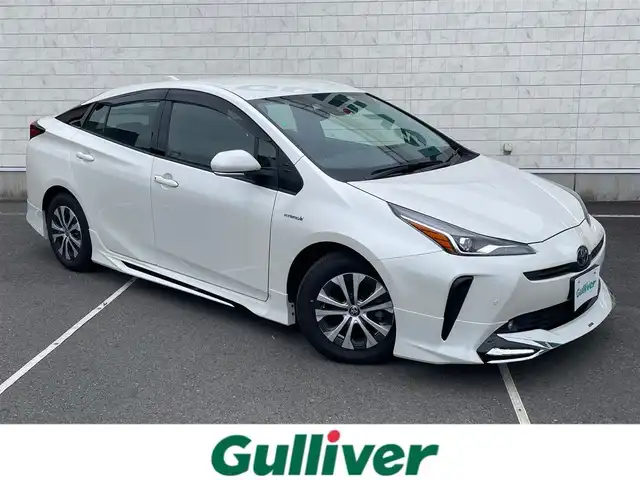 トヨタ プリウス A 静岡県 2019(令1)年 6.1万km ホワイトパールクリスタルシャイン 純正ナビ/・フルセグTV/・Bluetooth接続/・DVD再生/トヨタセーフティーセンス/HUD/パークアシスト/追従クルコン/モデリスタエアロ（F/S/R）/前後コーナーセンサー/プッシュスタート/スマートキー/スペアキー/D席パワーシート/LEDオートライト/オートハイビーム/ドラレコ/ビルトインETC2.0/取扱説明書