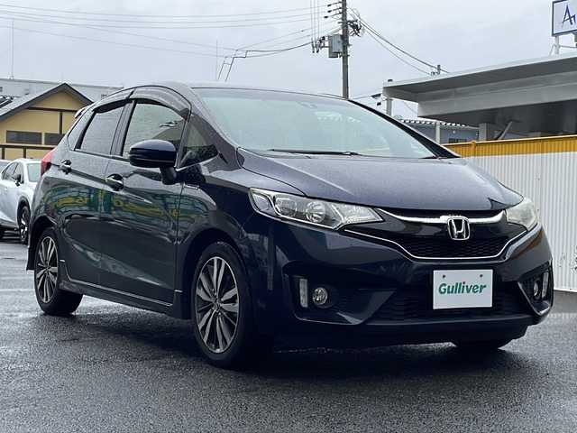 ホンダ フィット ハイブリット Sパッケージ 宮城県 2017(平29)年 4.1万km ミッドナイトブルービームM 登録時走行距離41081km/クルーズコントロール/純正ナビ/・バックカメラ/・フルセグTV/BT/CD/DVD/純正16インチアルミホイール/LEDヘッドライト/オートライト/フォグランプ/パドルシフト/ETC/電動格納ミラー/ドアバイザー/スペアキー×１/エアバックW/カーテン/前後ドライブレコーダー