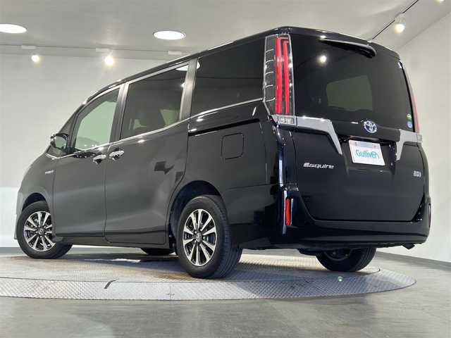 トヨタ エスクァイア ハイブリッド Gi プレミアムパッケージ 愛知県 2018(平30)年 5.3万km スパークリングブラックパールクリスタルシャイン 純正９インチナビ/フリップダウンモニター/両側パワースライドドア/衝突軽減ブレーキ/レーンキープアシスト/先行車発進告知/クルーズコントロール/ハンドルヒーター/シートヒーター/ハーフレザー/ドライブレコーダー/ビルトインＥＴＣ２．０/AC100V1500W/アクセサリーソケット/純正15インチアルミホイール