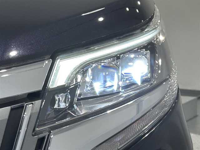 トヨタ エスクァイア ハイブリッド Gi プレミアムパッケージ 愛知県 2018(平30)年 5.3万km スパークリングブラックパールクリスタルシャイン 純正９インチナビ/フリップダウンモニター/両側パワースライドドア/衝突軽減ブレーキ/レーンキープアシスト/先行車発進告知/クルーズコントロール/ハンドルヒーター/シートヒーター/ハーフレザー/ドライブレコーダー/ビルトインＥＴＣ２．０/AC100V1500W/アクセサリーソケット/純正15インチアルミホイール