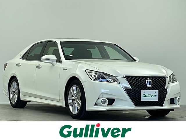 トヨタ クラウン ハイブリッド アスリートS 大阪府 2015(平27)年 5.8万km ホワイトパールクリスタルシャイン 純正８インチHDDナビ/【BT/フルセグTV/AUX/USB/DVD】/サンルーフ/ETC/バックカメラ/衝突被害軽減システム/クルーズコントロール追従無し/アイドリングストップ/オートライト/パワーシートD+N席/純正17インチアルミホイール/純正フロアマット/スマートキー