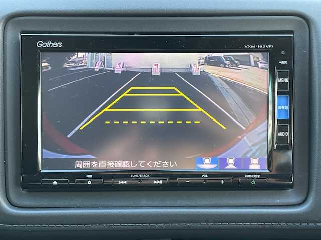 ホンダ ヴェゼル ハイブリッド X ホンダセンシング 静岡県 2018(平30)年 2.4万km プレミアムクリスタルレッドM ●社外ナビ/(フルセグ/CD/DVD/Bluetooth)/(VXM-185VFI)/●バックカメラ/●アダプティブクルーズコントロール/●衝突軽減ブレーキシステム/●車線維持支援システム/●誤発進抑制機能/●オートブレーキホールド/●電動サイドパーキング/●オートライト/●フォグランプ/●革巻きステアリング/●ステアリングスイッチ/●パドルシフト/●電動格納ウインカーミラー/●ETC/●純正フロアマット/●ドアバイザー/●自動防眩ミラー/●プッシュスタート/●スマートキー/●純正16インチアルミホイール/●W+サイド+カーテンSRS+ABS