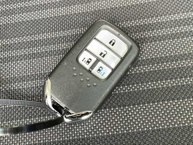 ホンダ フリード ハイブリット G ホンダセンシング 長野県 2016(平28)年 6.8万km コバルトブルーパール Ｓ・ＣコンフォートビューＰＫＧ/純正9型ナビフルセグTV/純正11型フリップダウンモニター/純正ドライブレコーダー/バックカメラ/ビルトインETC/両側パワースライドドア/ハーフレザーシート/純正15インチアルミ/ホンダセンシング/アダクティブクルーズコントロール/保証書・取説・スペアキー