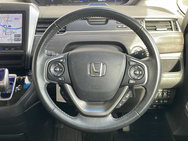 ホンダ フリード ハイブリット G ホンダセンシング 長野県 2016(平28)年 6.8万km コバルトブルーパール Ｓ・ＣコンフォートビューＰＫＧ/純正9型ナビフルセグTV/純正11型フリップダウンモニター/純正ドライブレコーダー/バックカメラ/ビルトインETC/両側パワースライドドア/ハーフレザーシート/純正15インチアルミ/ホンダセンシング/アダクティブクルーズコントロール/保証書・取説・スペアキー