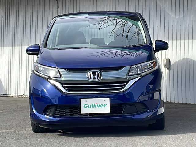 ホンダ フリード ハイブリット G ホンダセンシング 長野県 2016(平28)年 6.8万km コバルトブルーパール Ｓ・ＣコンフォートビューＰＫＧ/純正9型ナビフルセグTV/純正11型フリップダウンモニター/純正ドライブレコーダー/バックカメラ/ビルトインETC/両側パワースライドドア/ハーフレザーシート/純正15インチアルミ/ホンダセンシング/アダクティブクルーズコントロール/保証書・取説・スペアキー
