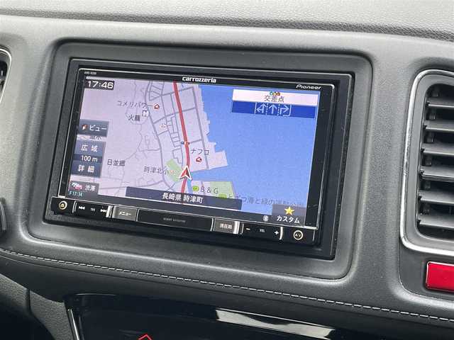 ホンダ ヴェゼル ハイブリッド Z 長崎県 2014(平26)年 9.4万km ホワイトオーキッドパール (株)IDOMが運営する【じしゃロン長崎店】の自社ローン専用車両になりますこちらは現金またはオートローンご利用時の価格です。自社ローンご希望の方は別途その旨お申付け下さい/ナビ　/バックカメラ　/ハーフレザーシート　/シートヒーター　/衝突被害軽減ブレーキ　/ＬＥＤヘッドライト　/オートライト　/フォグランプ　/クルーズコントロール　/パドルシフト　/ＥＴＣ　/プッシュスタート