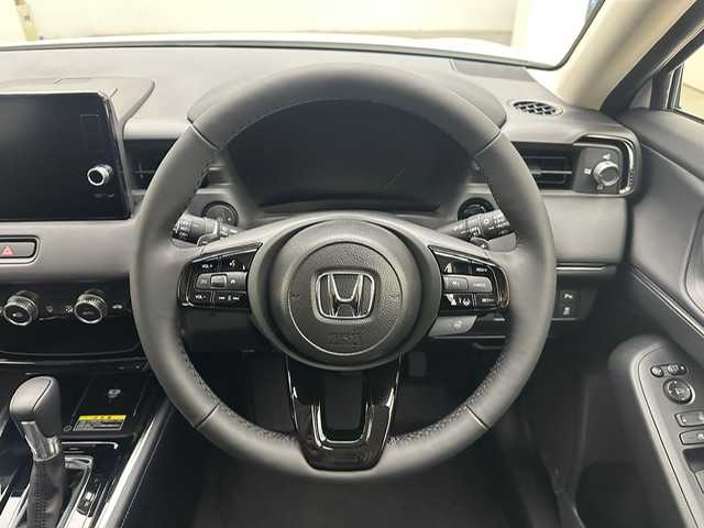 ホンダ ヴェゼル ハイブリッド e:HEV Z 兵庫県 2025(令7)年 0.1千km プラチナホワイトパール ・登録済み未使用車/・純正コネクトナビ/（フルセグ、ＢＴ、ＵＳＢ）　　/・apple　carplay/・androido auto/・バックカメラ　/・レーダークルーズコントロール　/・コーナーセンサー　　/・踏み間違い　/・PCS/・BSI/・LKA/・DAC/・BREAK　HOLD/・ビルトインETC２．０　/・パワーバックドア/・シートヒーター　/・ISOFIX　/・ハーフレザー/・ステアリングヒーター/・パドルシフト/・ＬＥＤヘッドライト/・LEDフォグランプ/・オートハイ/・オートライト/・スペアキー×１/・ワイヤレス充電/・電子パーキング　