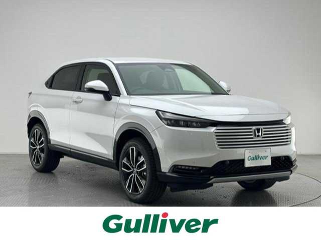 ホンダ ヴェゼル ハイブリッド e:HEV Z 兵庫県 2025(令7)年 0.1千km プラチナホワイトパール ・登録済み未使用車/・純正コネクトナビ/（フルセグ、ＢＴ、ＵＳＢ）　　/・apple　carplay/・androido auto/・バックカメラ　/・レーダークルーズコントロール　/・コーナーセンサー　　/・踏み間違い　/・PCS/・BSI/・LKA/・DAC/・BREAK　HOLD/・ビルトインETC２．０　/・パワーバックドア/・シートヒーター　/・ISOFIX　/・ハーフレザー/・ステアリングヒーター/・パドルシフト/・ＬＥＤヘッドライト/・LEDフォグランプ/・オートハイ/・オートライト/・スペアキー×１/・ワイヤレス充電/・電子パーキング　