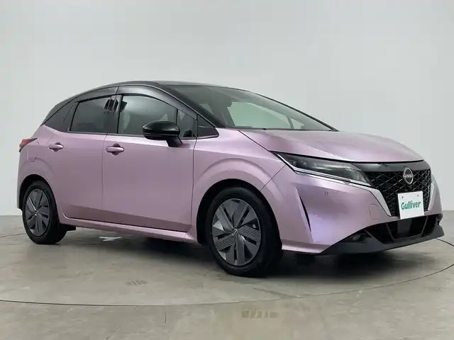 日産 ノート X 鹿児島県 2022(令4)年 1.2万km ピンクⅡ 純正メモリナビ/（AM/FM/CD/DVD/Bluetooth）/アラウンドビューモニター/ブラインドスポットモニター/インテリジェントルームミラー/ETC2.0/ドライブレコーダー/コーナーセンサー/レーンキープアシスト/盗難防止装置/オートライト/LEDヘッドライト/衝突被害軽減システム/純正ドアバイザー