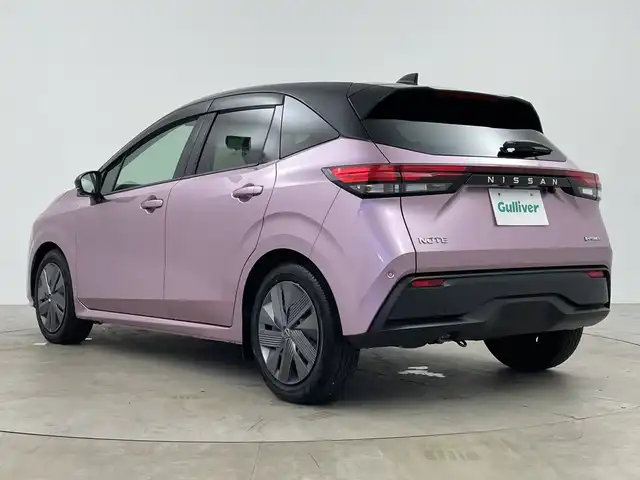日産 ノート X 鹿児島県 2022(令4)年 1.2万km ピンクⅡ 純正メモリナビ/（AM/FM/CD/DVD/Bluetooth）/アラウンドビューモニター/ブラインドスポットモニター/インテリジェントルームミラー/ETC2.0/ドライブレコーダー/コーナーセンサー/レーンキープアシスト/盗難防止装置/オートライト/LEDヘッドライト/衝突被害軽減システム/純正ドアバイザー