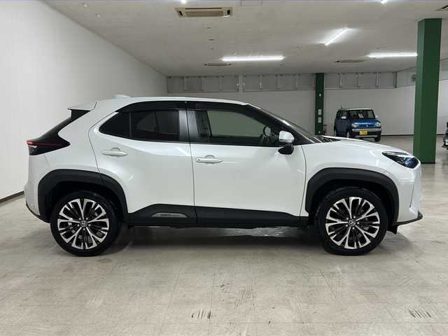 トヨタ ヤリスクロス ハイブリッド Z 熊本県 2023(令5)年 1.2万km プラチナホワイトパールマイカ 純正８インチディスプレイオーディオ/(Bluetooth/USB/applecarplay/フルセグTV)/全方位カメラ/クリアランスソナー/レーダークルーズコントロール/ETC/前後ドライブレコーダー/ハーフレザーシート/シートヒーター/ステアリングヒーター/ステアリングスイッチ/オートライト/オートハイビーム/LEDヘッドライト/電子パーキングブレーキ