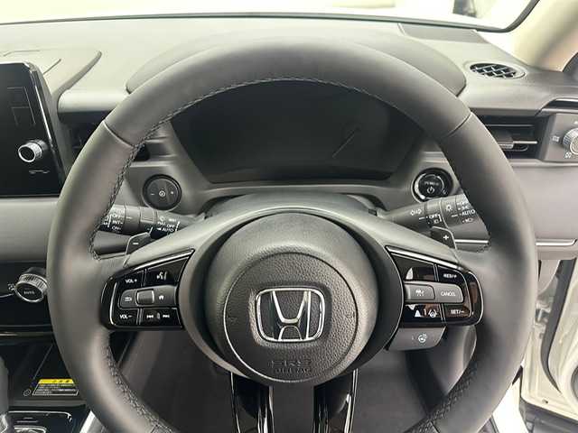 ホンダ ヴェゼル ハイブリッド e:HEV Z 兵庫県 2025(令7)年 0.1千km プラチナホワイトパール 登録済み未使用車/ハーフレザーシート/シートヒーター/ホンダセンシング/純正コネクトナビ＆フルセグTV/（USB＆BT＆AppleCarplay＆Androidauto)/バックカメラ/ワイヤレス充電器/ビルトインETC/パワーバックドア/オートライト/LEDライト/LEDフォグ/ステアリングヒーター/パドルシフト/コーナーセンサー/スマートキー/プッシュスタート