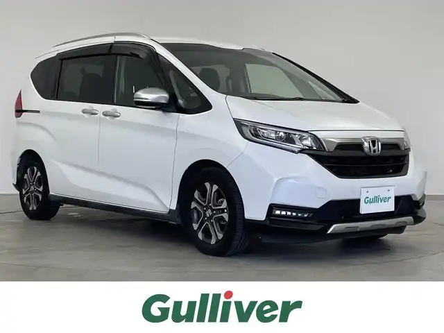 ホンダ フリード クロスター ホンダセンシング 埼玉県 2021(令3)年 4.5万km プラチナホワイトパール 純正メモリナビ/ CD DVD Bluetooth フルセグ/バックカメラ/レーダークルーズコントロール/前後ドライブレコーダー/両側パワースライドドア/ビルトインETC/シートヒーター/ハーフレザーシート/衝突被害軽減/前後コーナーセンサー/純正15インチアルミホイール