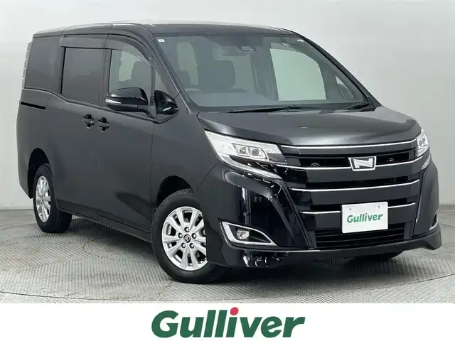 トヨタ ノア G 道央・札幌 2018(平30)年 3.7万km ブラック ・４WD/・寒冷地仕様/・純正9インチナビ/　CD/DVD/SD/BT/フルセグ/・純正フリップダウンモニター/・ビルトインETC2.0/・プリクラッシュセーフティ/・クルーズコントロール/・レーンキープアシスト/・クリアランスソナー/・オートハイビーム/・両側パワースライドドア/・前席シートヒーター/・LEDヘッドライト/・フォグライト/・オートライト/・プッシュスタート/・スマートキー/・純正フロアマット/・ドアバイザー