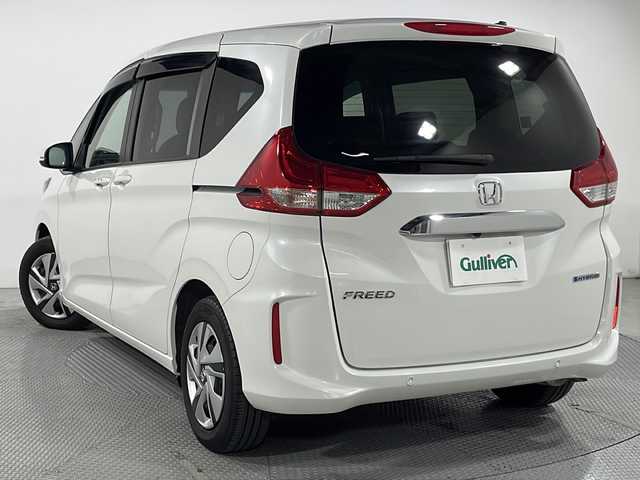 ホンダ フリード ハイブリット G 広島県 2023(令5)年 2.9万km プラチナホワイトパール 純正9型ナビ/両側パワースライドドア/バックカメラ/シートヒーター/ホンダセンシング/・衝突軽減ブレーキ/・レーンキープアシスト/・アダプティブクルーズコントロール/・誤発進抑制機能/LEDヘッドランプ/オートライト/ETC/ドライブレコーダー/USB入力端子
