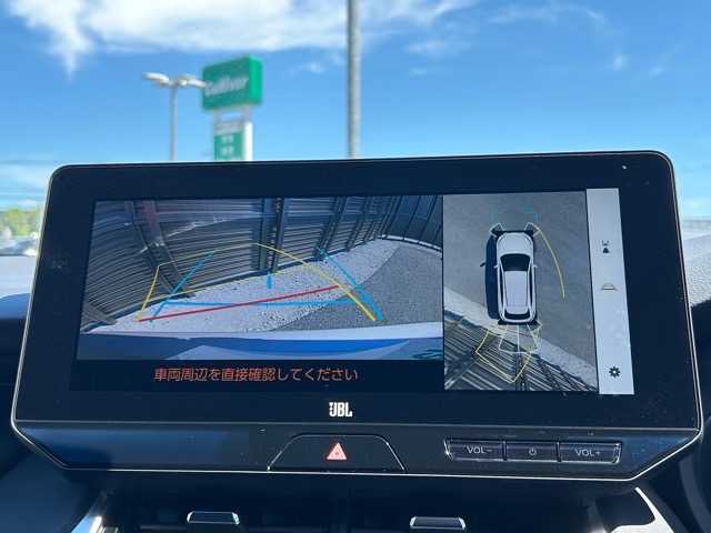 トヨタ ハリアー ハイブリッド Z レザーパッケージ 千葉県 2024(令6)年 0.4万km スティールブロンドM JBLディスプレイオーディオ/純正ナビ/フルセグテレビ/Bluetooth/Miracast/ETC2.0/パノラミックビューモニター/純正デジタルインナーミラー/ヘッドアップディスプレイ/パワーバックドア/レーンキープアシスト/プラインドスポットモニター/プリクラッシュセーフティー/リアクロストラフィックアラート/ロードサインアシスト/左右分離型オートエアコン/前席パワーシート/前席シートヒーター/前席エアシート/ステアリングヒーター/オートライト/オートマチックハイビーム/LEDヘッドライト/電動格納ウインカーミラー/電動パーキングブレーキ/プッシュスタート/スマートキー/純正ドアバイザー/純正フロアマット/純正アルミホイール/保証書/取扱説明書