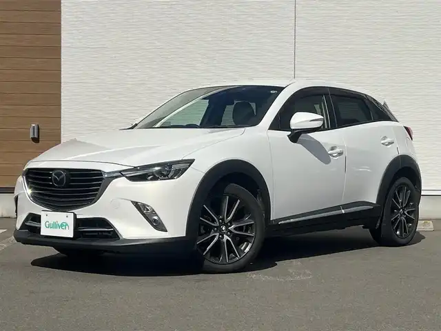マツダ ＣＸ－３ XD ツーリング Lパッケージ 秋田県 2015(平27)年 9.5万km クリスタルホワイトパールマイカ ４WD/ターボ/衝突軽減システム/LEDヘッドライト/純正SDナビ/フルセグ/バックカメラ/マツダ純正18インチアルミ（夏タイヤ装着）/スマートキー/純正エンジンスターター/アイドリングストップ/プッシュスタート/クルーズコントロール追従走行有/レーンキープアシスト/オートマチックハイビーム/AFS（アダプティブ・フロントライティング・システム）/MTモード付AT/ステアリングスイッチ/パドルシフト/ブラインドスポットモニター/前席シートヒーター/ETC/純正フロアマット/純正ドアバイザー/オートライト/オートエアコン/パワーステアリング/パワーウィンドウ/横滑り防止/盗難防止装置/寒冷地仕様/電動格納ウィンカーミラー/キーレスエントリー/保証書/取扱説明書/記録簿/スペアキー1本有
