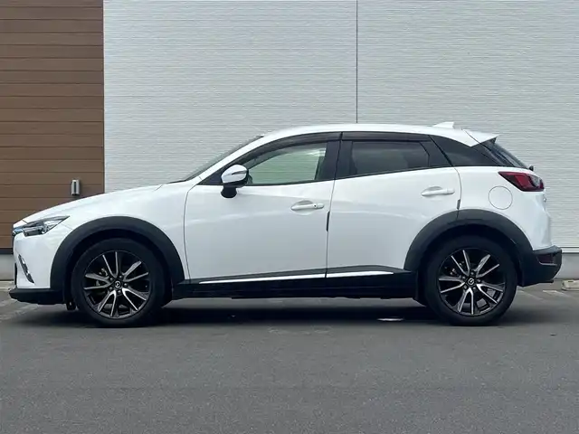 マツダ ＣＸ－３ XD ツーリング Lパッケージ 秋田県 2015(平27)年 9.5万km クリスタルホワイトパールマイカ ４WD/ターボ/衝突軽減システム/LEDヘッドライト/純正SDナビ/フルセグ/バックカメラ/マツダ純正18インチアルミ（夏タイヤ装着）/スマートキー/純正エンジンスターター/アイドリングストップ/プッシュスタート/クルーズコントロール追従走行有/レーンキープアシスト/オートマチックハイビーム/AFS（アダプティブ・フロントライティング・システム）/MTモード付AT/ステアリングスイッチ/パドルシフト/ブラインドスポットモニター/前席シートヒーター/ETC/純正フロアマット/純正ドアバイザー/オートライト/オートエアコン/パワーステアリング/パワーウィンドウ/横滑り防止/盗難防止装置/寒冷地仕様/電動格納ウィンカーミラー/キーレスエントリー/保証書/取扱説明書/記録簿/スペアキー1本有