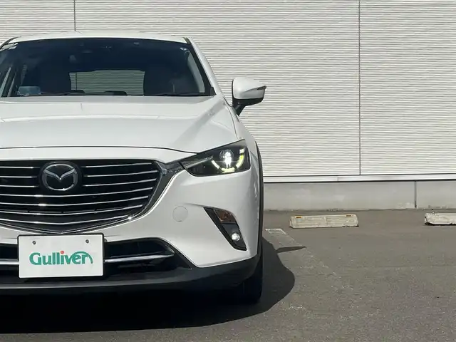 マツダ ＣＸ－３ XD ツーリング Lパッケージ 秋田県 2015(平27)年 9.5万km クリスタルホワイトパールマイカ ４WD/ターボ/衝突軽減システム/LEDヘッドライト/純正SDナビ/フルセグ/バックカメラ/マツダ純正18インチアルミ（夏タイヤ装着）/スマートキー/純正エンジンスターター/アイドリングストップ/プッシュスタート/クルーズコントロール追従走行有/レーンキープアシスト/オートマチックハイビーム/AFS（アダプティブ・フロントライティング・システム）/MTモード付AT/ステアリングスイッチ/パドルシフト/ブラインドスポットモニター/前席シートヒーター/ETC/純正フロアマット/純正ドアバイザー/オートライト/オートエアコン/パワーステアリング/パワーウィンドウ/横滑り防止/盗難防止装置/寒冷地仕様/電動格納ウィンカーミラー/キーレスエントリー/保証書/取扱説明書/記録簿/スペアキー1本有