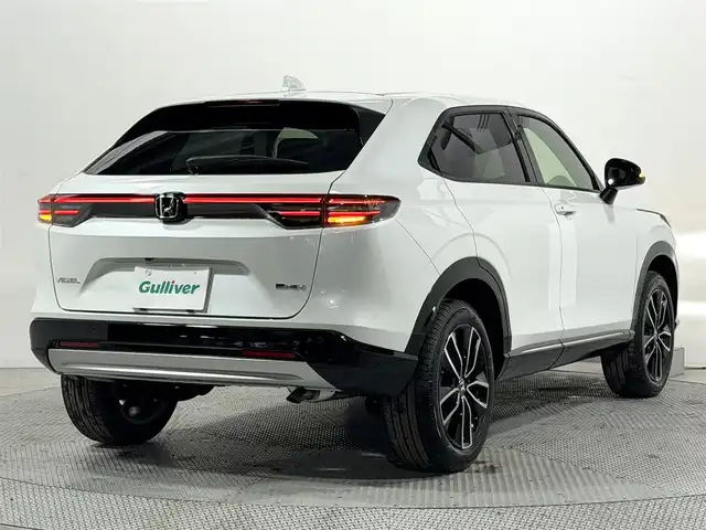 ホンダ ヴェゼル ハイブリッド e:HEV Z 大阪府 2025(令7)年 0.1千km プラチナホワイトパール 登録済未使用車 純正9incナビTV バックカメラ ハーフレザー シート＆ハンドルヒーター 電動リアゲート レーダークルコン 衝突軽減ブレーキ レーンアシスト ブラインドSM ダウンヒルアシスト 置き型充電