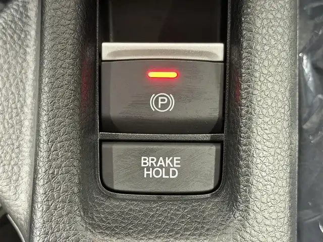 ホンダ ヴェゼル ハイブリッド e:HEV Z 大阪府 2025(令7)年 0.1千km プラチナホワイトパール 登録済未使用車 純正9incナビTV バックカメラ ハーフレザー シート＆ハンドルヒーター 電動リアゲート レーダークルコン 衝突軽減ブレーキ レーンアシスト ブラインドSM ダウンヒルアシスト 置き型充電