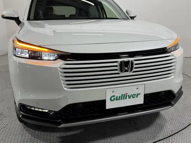ホンダ ヴェゼル ハイブリッド e:HEV Z 大阪府 2025(令7)年 0.1千km プラチナホワイトパール 登録済未使用車 純正9incナビTV バックカメラ ハーフレザー シート＆ハンドルヒーター 電動リアゲート レーダークルコン 衝突軽減ブレーキ レーンアシスト ブラインドSM ダウンヒルアシスト 置き型充電