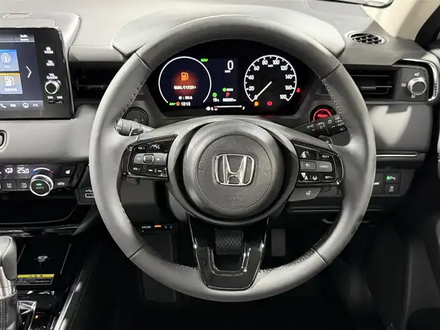 ホンダ ヴェゼル ハイブリッド e:HEV Z 大阪府 2025(令7)年 0.1千km プラチナホワイトパール 登録済未使用車 純正9incナビTV バックカメラ ハーフレザー シート＆ハンドルヒーター 電動リアゲート レーダークルコン 衝突軽減ブレーキ レーンアシスト ブラインドSM ダウンヒルアシスト 置き型充電