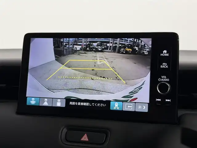 ホンダ ヴェゼル ハイブリッド e:HEV Z 大阪府 2025(令7)年 0.1千km プラチナホワイトパール 登録済未使用車 純正9incナビTV バックカメラ ハーフレザー シート＆ハンドルヒーター 電動リアゲート レーダークルコン 衝突軽減ブレーキ レーンアシスト ブラインドSM ダウンヒルアシスト 置き型充電