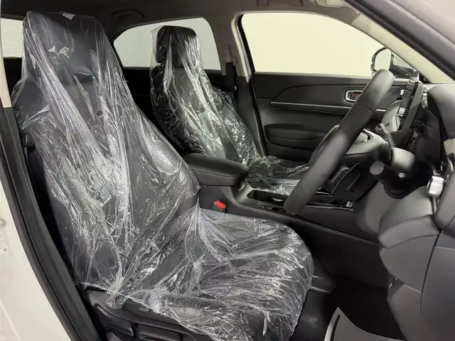 ホンダ ヴェゼル ハイブリッド e:HEV Z 大阪府 2025(令7)年 0.1千km プラチナホワイトパール 登録済未使用車 純正9incナビTV バックカメラ ハーフレザー シート＆ハンドルヒーター 電動リアゲート レーダークルコン 衝突軽減ブレーキ レーンアシスト ブラインドSM ダウンヒルアシスト 置き型充電