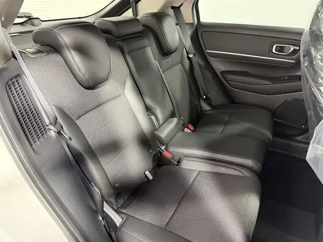 ホンダ ヴェゼル ハイブリッド e:HEV Z 大阪府 2025(令7)年 0.1千km プラチナホワイトパール 登録済未使用車 純正9incナビTV バックカメラ ハーフレザー シート＆ハンドルヒーター 電動リアゲート レーダークルコン 衝突軽減ブレーキ レーンアシスト ブラインドSM ダウンヒルアシスト 置き型充電