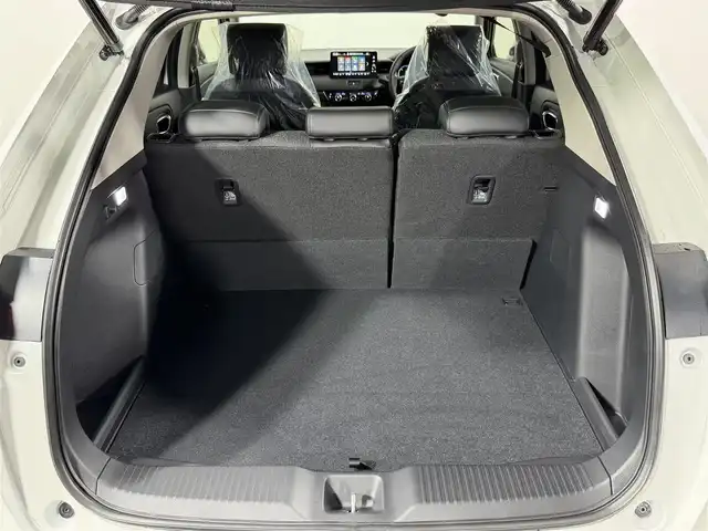 ホンダ ヴェゼル ハイブリッド e:HEV Z 大阪府 2025(令7)年 0.1千km プラチナホワイトパール 登録済未使用車 純正9incナビTV バックカメラ ハーフレザー シート＆ハンドルヒーター 電動リアゲート レーダークルコン 衝突軽減ブレーキ レーンアシスト ブラインドSM ダウンヒルアシスト 置き型充電