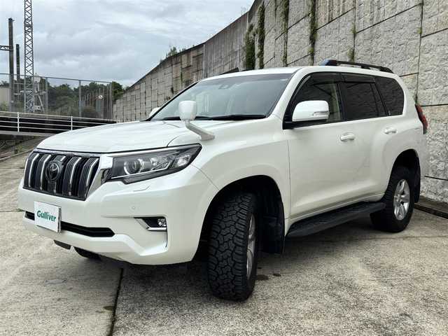 トヨタ ランドクルーザー プラド TX 長崎県 2018(平30)年 6万km ホワイトパールクリスタルシャイン ワンオーナー/純正9インチナビ/(CD/DVD/BT/フルセグ)/バックカメラ/衝突軽減ブレーキ/レーンアシスト/コーナーセンサー/レーダークルーズ/ETC/オートライト/フォグランプ/ドライブレコーダー/ルーフレール