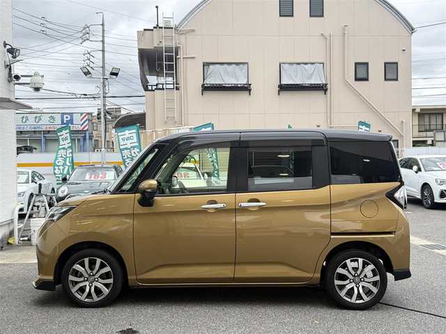 トヨタ タンク カスタムG－T 愛知県 2017(平29)年 9.5万km ブラックマイカメタリック/インペリアルゴールドクリスタルメタリック 2トーン /禁煙車//純正9インチナビ//フルセグ/CD/DVD/SD/Bluetooth/MSV/ラジオ//ステアリング連動バックカメラ//ビルトインETC//ドライブレコーダー//両側パワースライドドア//シートヒーター//クルーズコントロール//スマートアシストII//衝突回避支援ブレーキ機能//衝突警報機能//誤発進抑制制御機能//後方誤発進抑制制御機能//車線逸脱警報//先行車発進お知らせ機能//LEDオートヘッドライト//フォグランプ//リアロールサンシェード//シートバックテーブル//プッシュスタート//スペアスマートキー//純正15インチアルミホイール//スペアタイヤ//TRC//SPORTモード//アイドリングストップ//オートリトラクタブルウィンカーミラー//純正フロアマット//純正ドアバイザー//革巻きステアリング//ステアリングリモコン//チルトハンドル//シートリフター//保証書//取扱説明書//ナビ取扱説明書//点検整備記録簿H29.30.31.R2