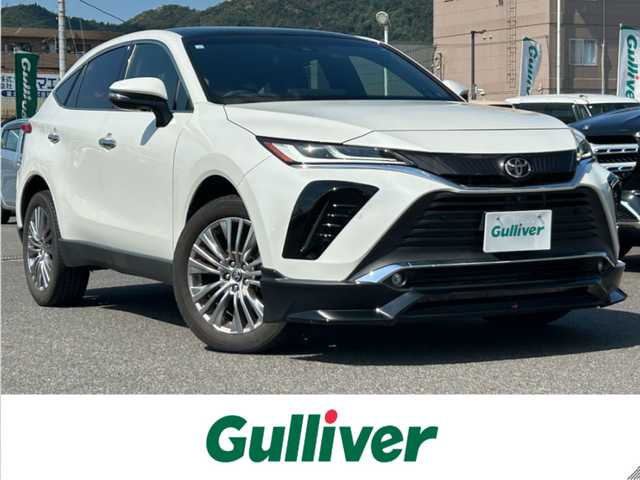 トヨタ ハリアー Z レザーパッケージ 広島県 2020(令2)年 3.7万km ホワイトパールクリスタルシャイン ワンオーナー/メーカーオプションナビ/　（フルセグテレビ/Bluetooth/AM/FM）/JBLプレミアムサウンド/GRエアロパーツ/調光パノラマルーフ/デジタルインナーミラー/レーダークルーズコントロール/全方位モニター/ヘッドアップディスプレイ/電動リアゲート/パワーシート/エアシート/純正19インチアルミホイール/ETC2.0/USB入力端子/コーナーセンサー/ブラインドスポットモニター/ワイヤレスチャージャー/電子パーキング/オートブレーキホールド/ステアリングヒーター/横滑り防止装置/レーンキープアシスト/オートマチックハイビーム/フロアマット/LEDヘッドライト/フォグランプ/衝突被害軽減システム/盗難防止装置/W+サイドエアバック/カーテンエアバック/スペアキー/保証書/取扱説明書