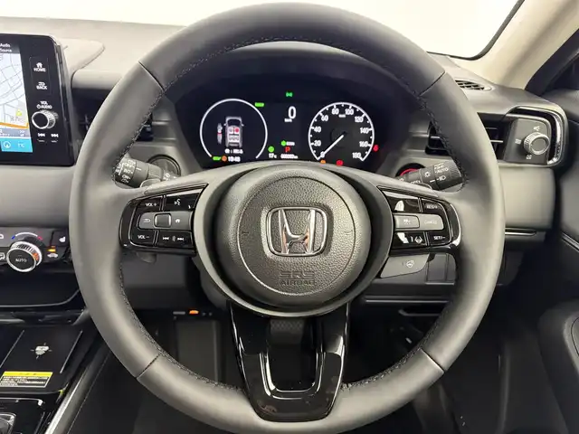 ホンダ ヴェゼル ハイブリッド e:HEV Z 愛知県 2025(令7)年 0.1千km 黒 登録済未使用車/登録時走行距離3km/純正ディスプレイオーディオ/フルセグTV/Bluetooth/USB/AppleCarPlay/AndroidAuto/バックカメラ/ホンダセンシング/衝突軽減ブレーキ/レーンキープアシスト/アダプティブクルーズコントロール/前後コーナーセンサー/ブラインドスポットインフォメーション/先行車発進お知らせ機能/ハーフレザーシート/前席シートヒーター/本革ステアリング/ステアリングヒーター/電動リアゲート/ビルトインETC2.0/ワイヤレス充電/オートブレーキホールド/ステリングスイッチ/スマートキー/スペアキー